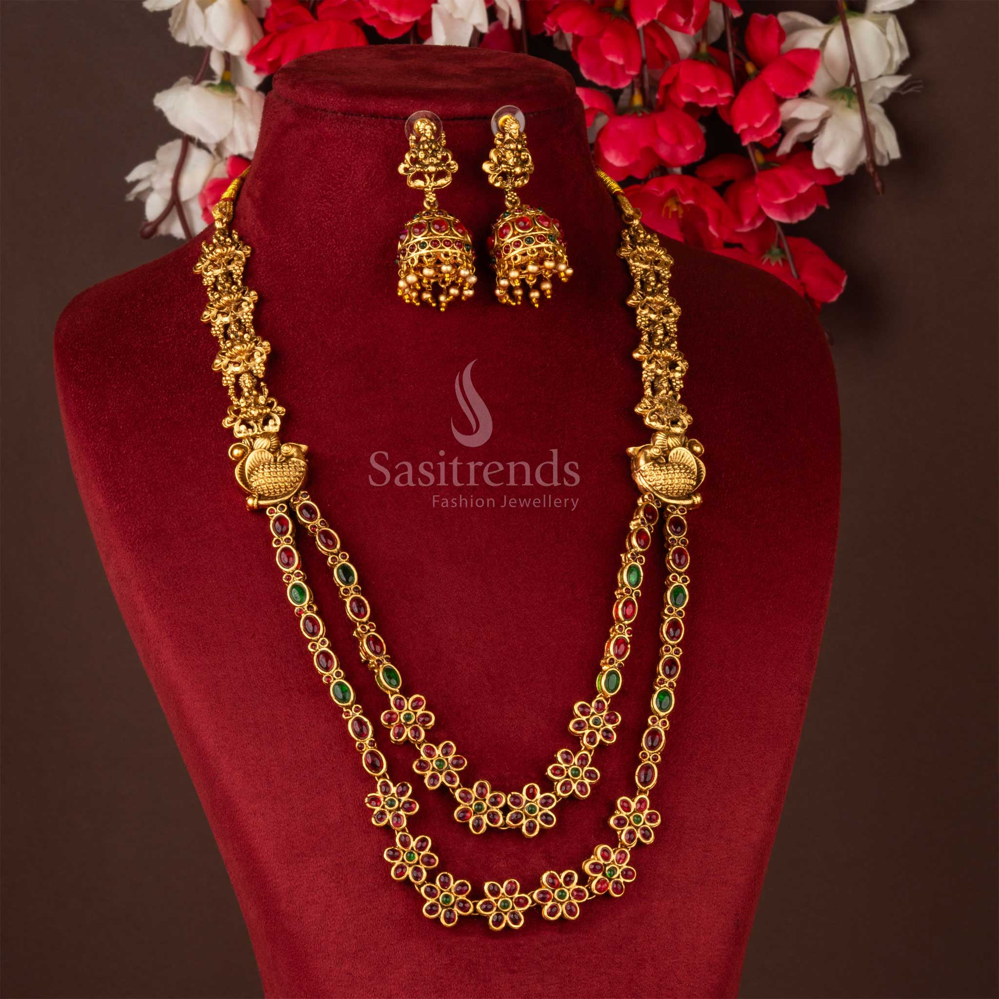 Divine classic matte gold Divine Lakshmi temple long necklace set featuring sacred motifs and complementary Jhumka jewellery, perfect for devotional and ceremonial occasions from Sasitrends