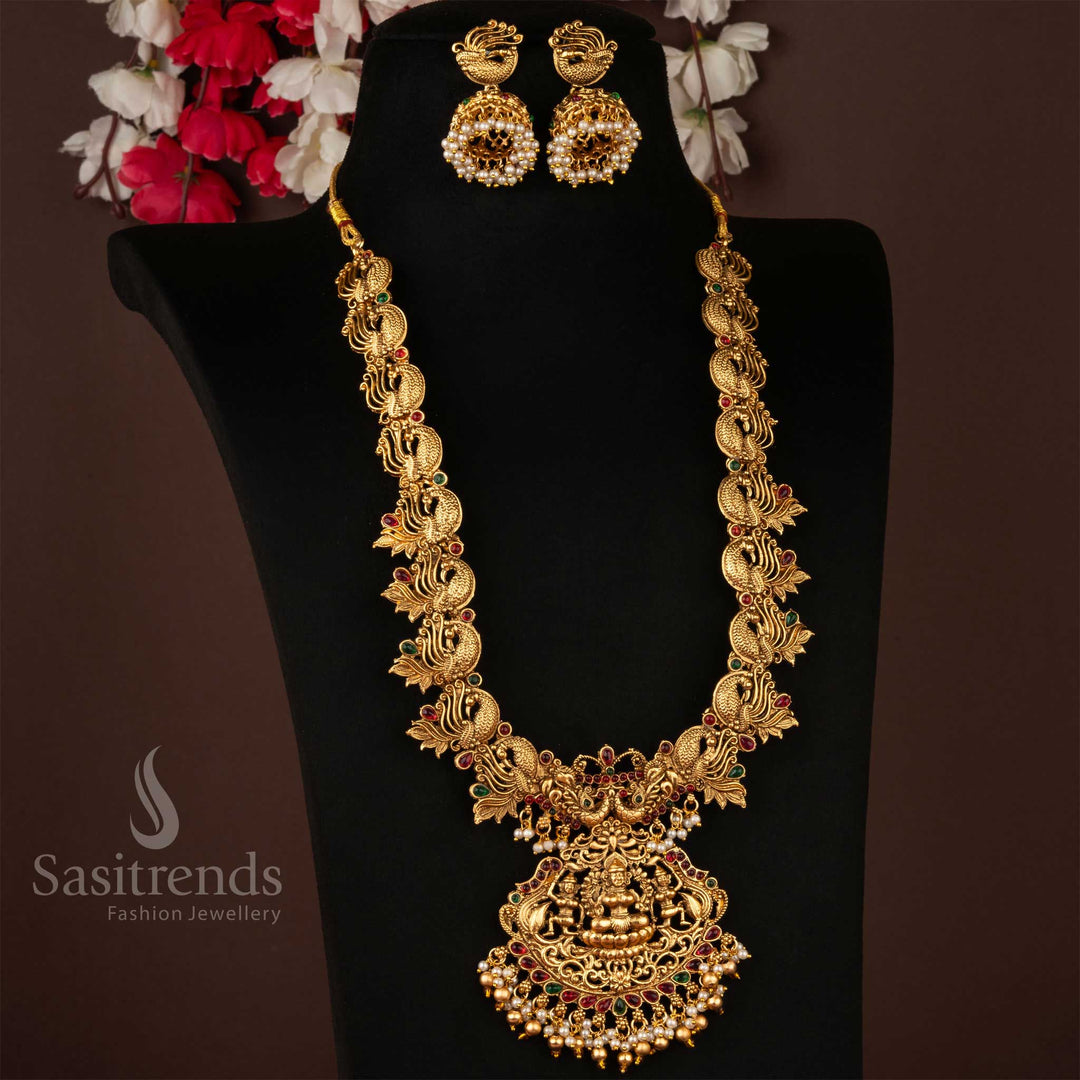 Regal matte gold plated jewellery set with a divine Lakshmi long necklace paired with exquisite jhumkas, combining elegance and heritage for bridal occasions and festive ceremonies – Sasitrends