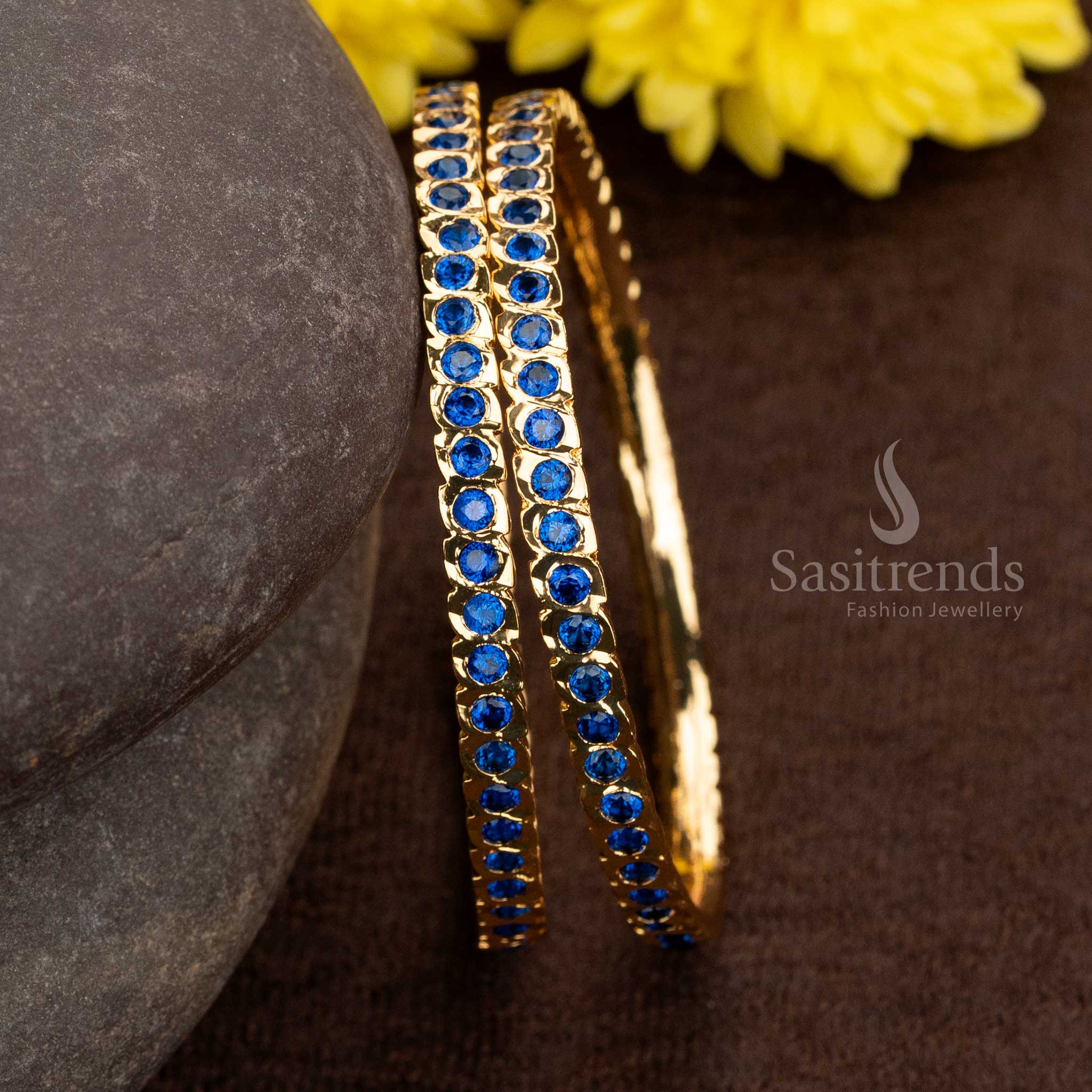Elegant royal blue Impon gold plated bangles highlighted with American diamond accents – designed for graceful cultural functions and vibrant saree-style looks – Sasitrends