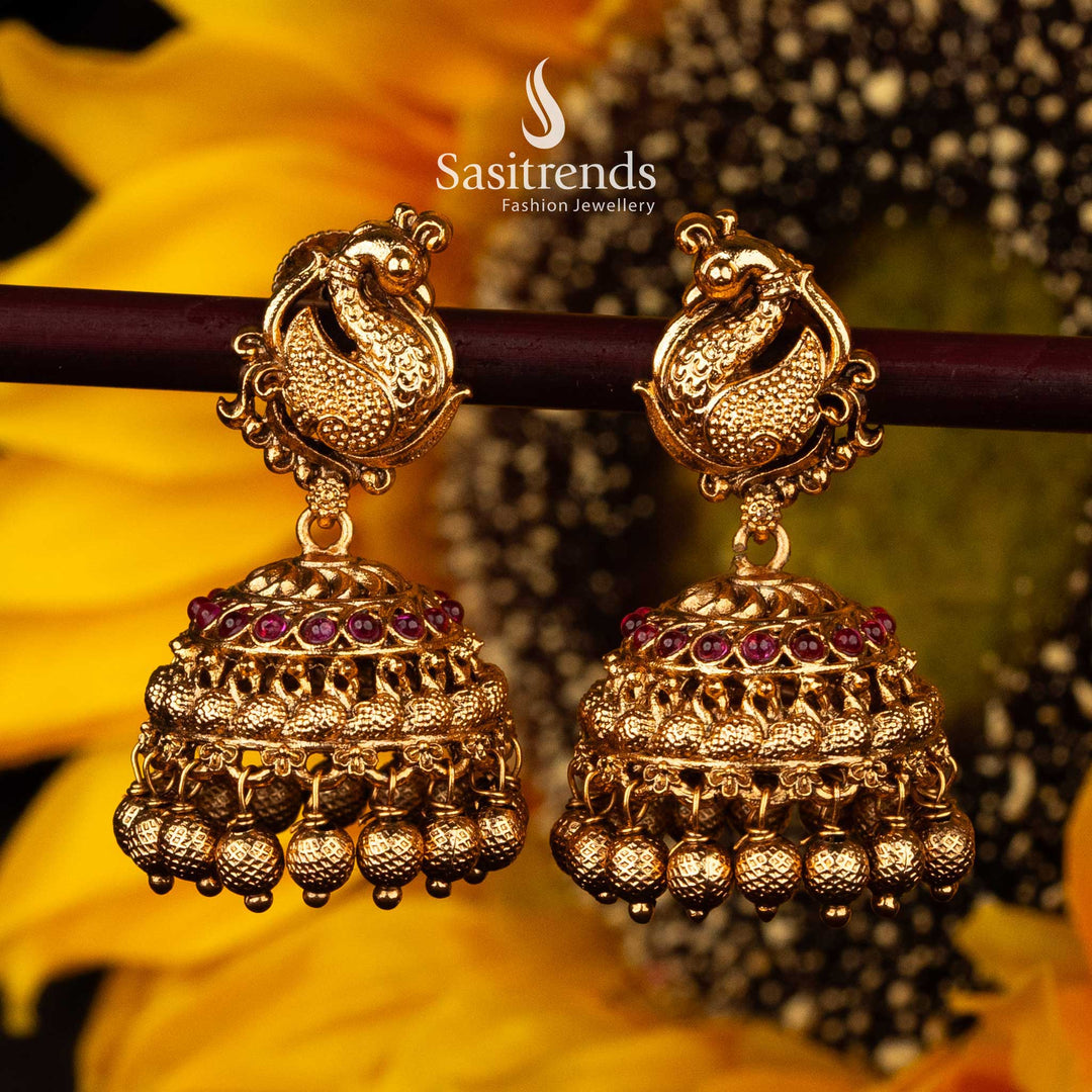 Traditional Peacock Motif Temple Matte Gold Jhumka Earrings with Ruby and Green Stones Sasitrends
