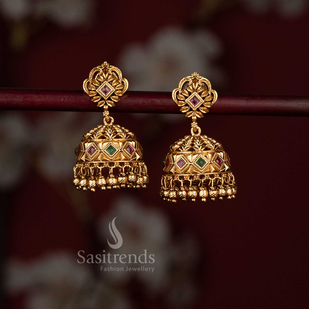 Matte gold temple jhumkas with ruby Green stones and hanging golden beads - Sasitrends 