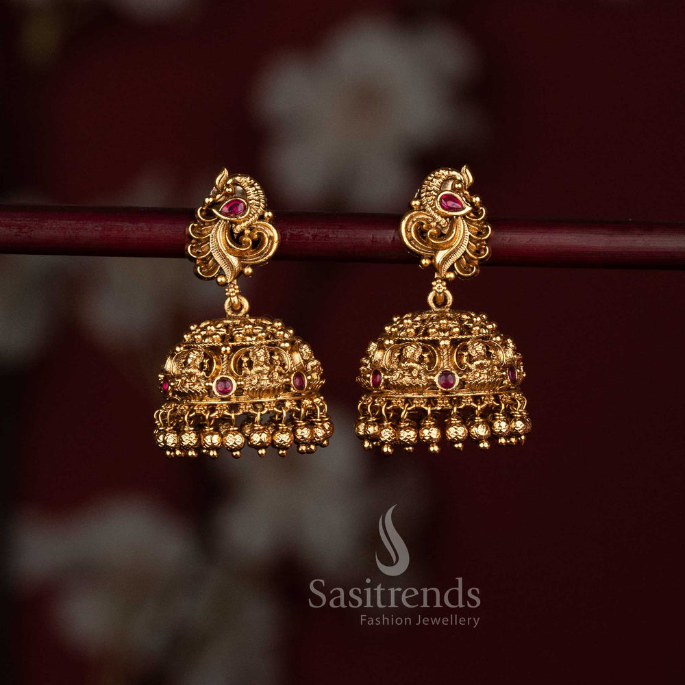 Premium matte gold temple jhumkas with intricate design and hanging golden beads - Sasitrends