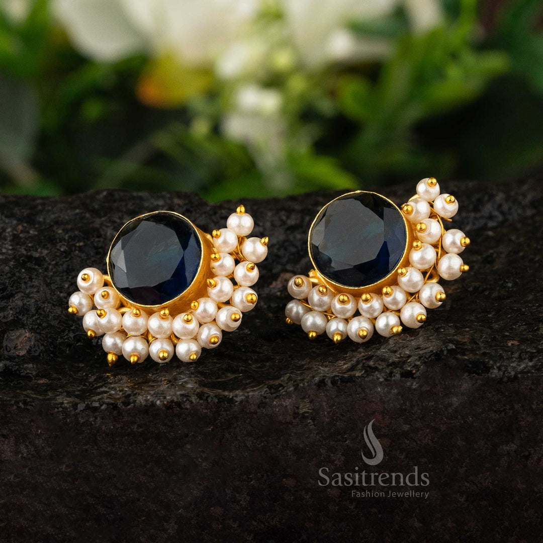 Gold-plated earrings featuring deep blue stone and pearls by sasitrends