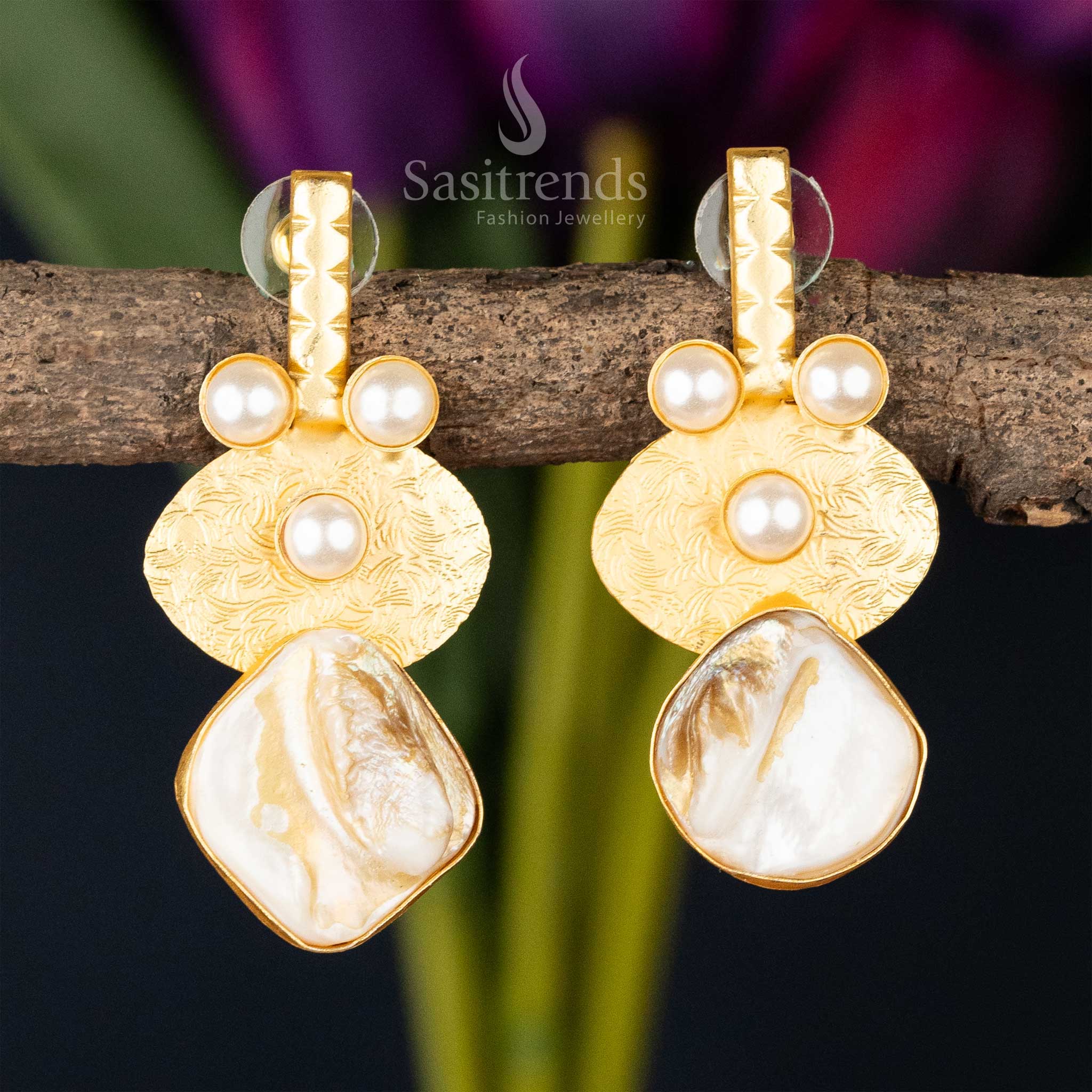 Elegant gold disc earrings with pearl embellishments and Mother of Pearl drop
