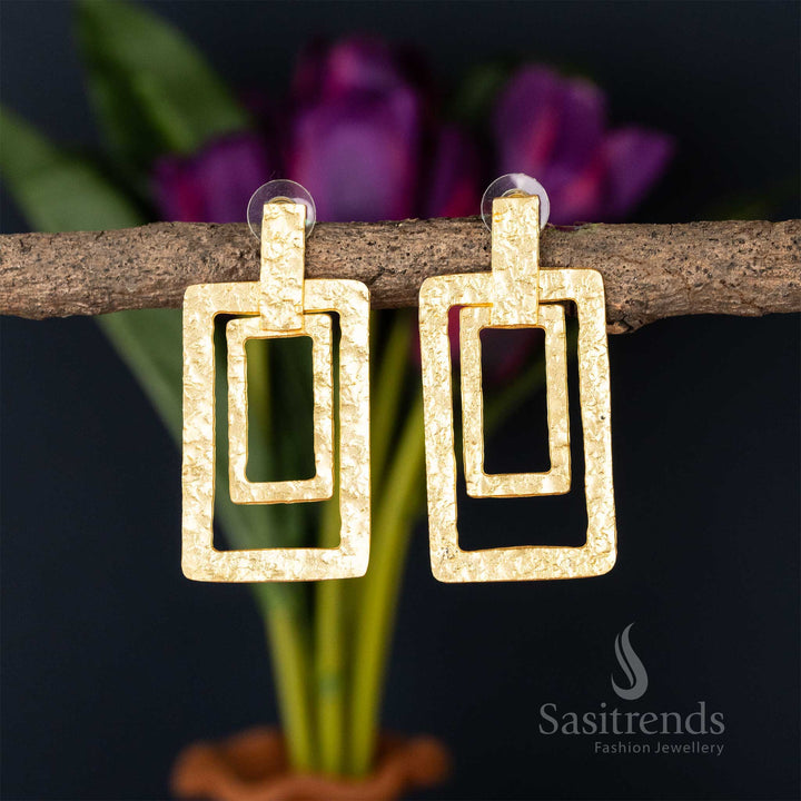 Rectangular drop gold-plated earrings with a hammered texture
