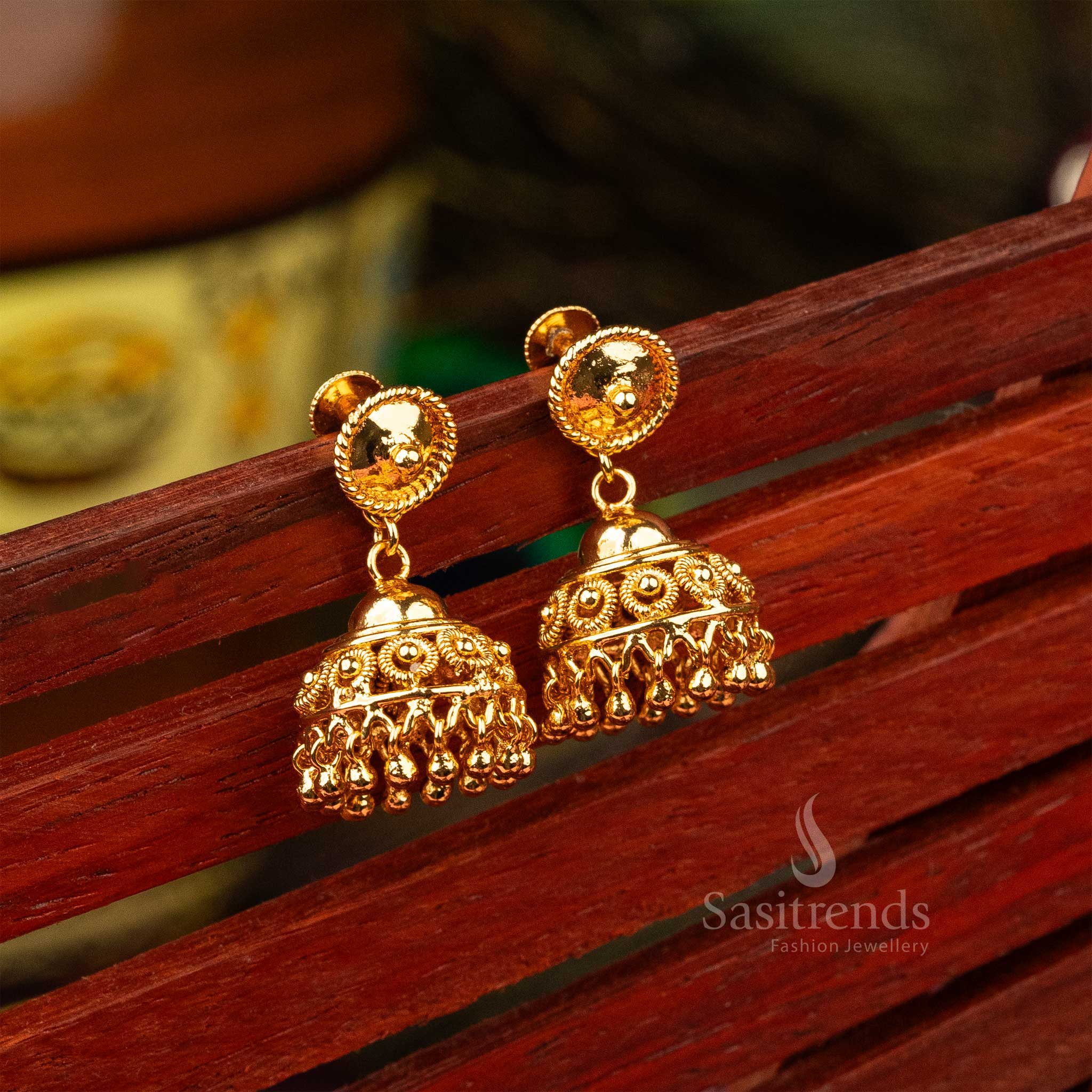 Sophisticated graceful polished micro gold plated Kerala style wedding jhumkas radiating bridal beauty and grandeur - Sasitrends