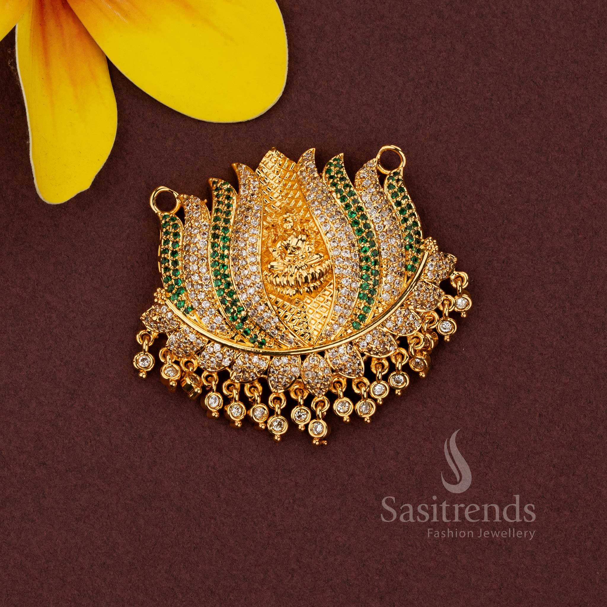 Traditional South Indian temple jewellery pendant featuring Goddess Lakshmi in a lotus motif, white green stones, CZ diamonds, micro gold plating, and premium luxurious craftsmanship for bridal wear - Sasitrends