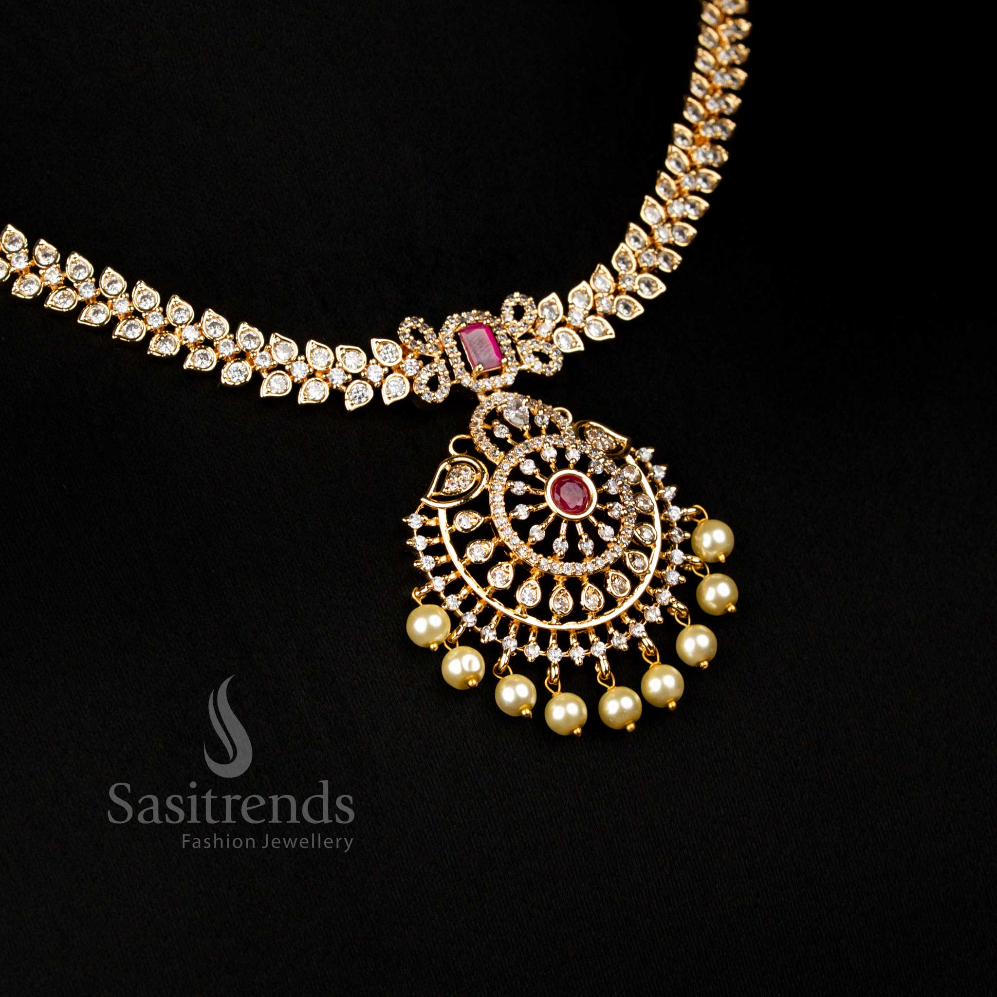 Grand white-ruby micro gold plated necklace set with Round floral pendant  leaf pattern , embellished with American Diamond stones for an elegant festive look - Sasitrends