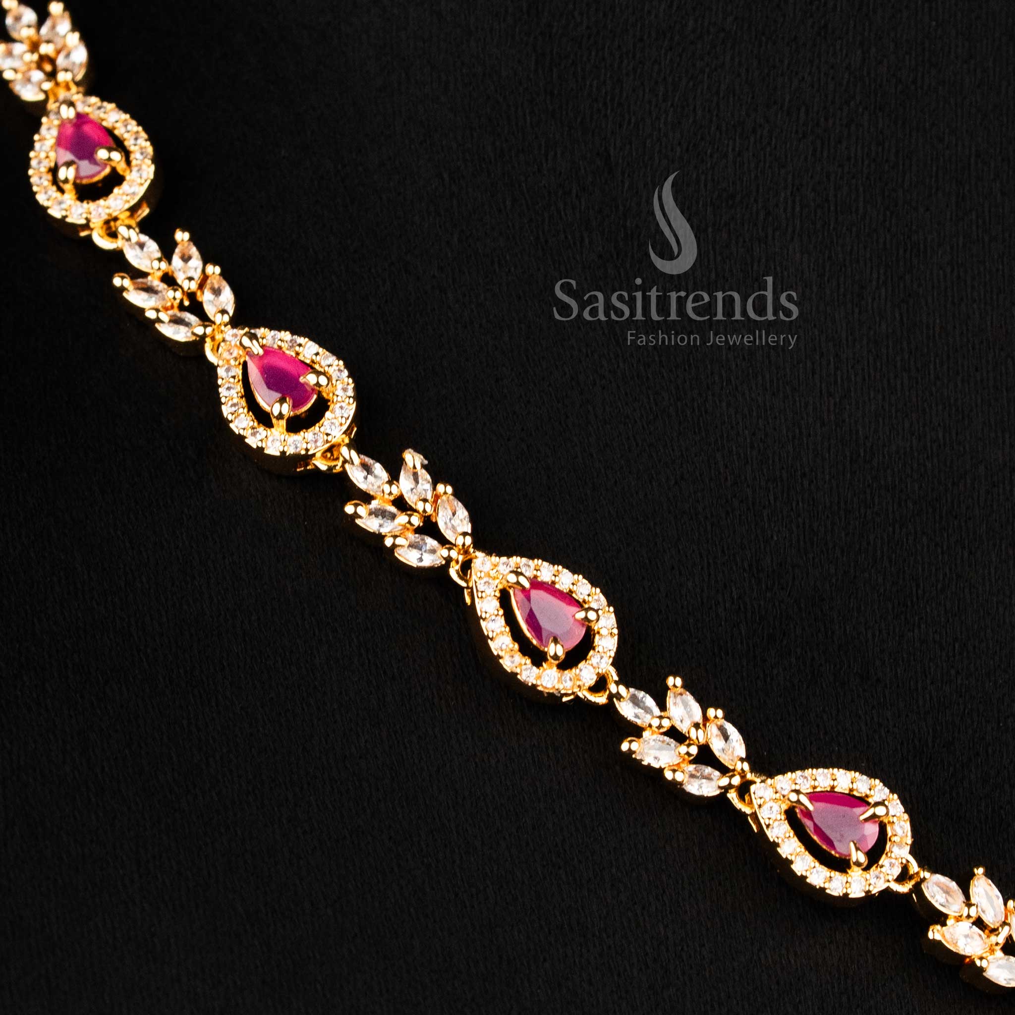 Micro gold plated AD necklace set with teardrop ruby stones and matching earrings 