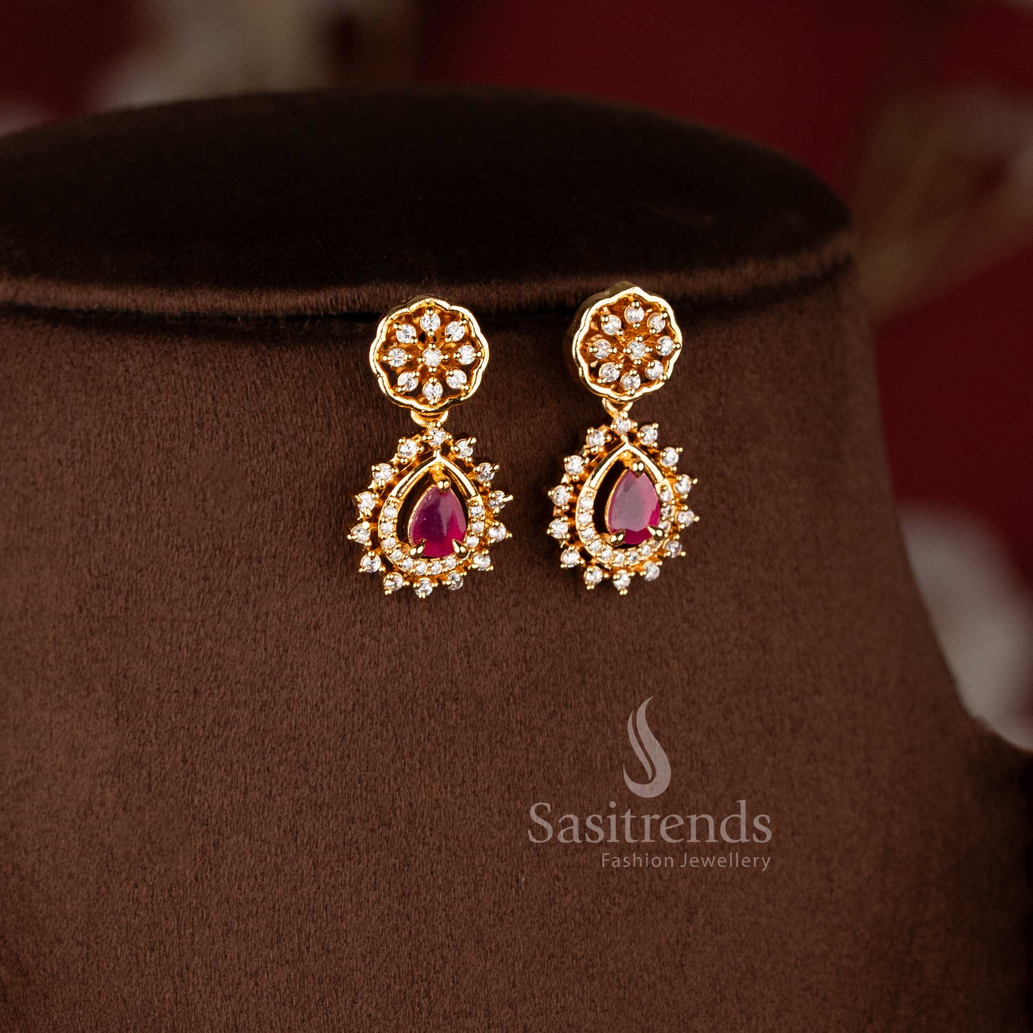 Elegant Floral Swirl ruby necklace set with American Diamond stones and micro gold plated finish for festive and bridal wear - Sasitrends