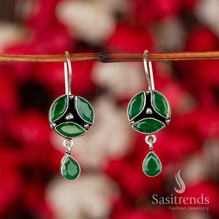 Glossy Green Oxidised Silver Earrings With Floral Pattern And Sheen Stones – Traditional Glam Jewellery For Graceful Charm - Sasitrends

