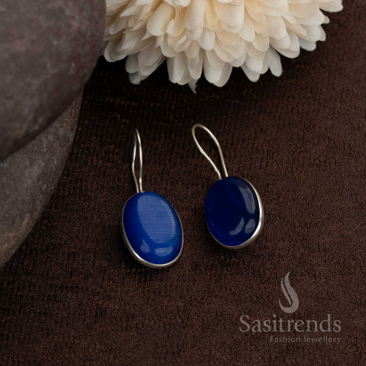 Bold oxidised round earrings featuring a brilliant blue natural stone centre perfect for smart office styling and Indo-western fusion outfits by Sasitrends