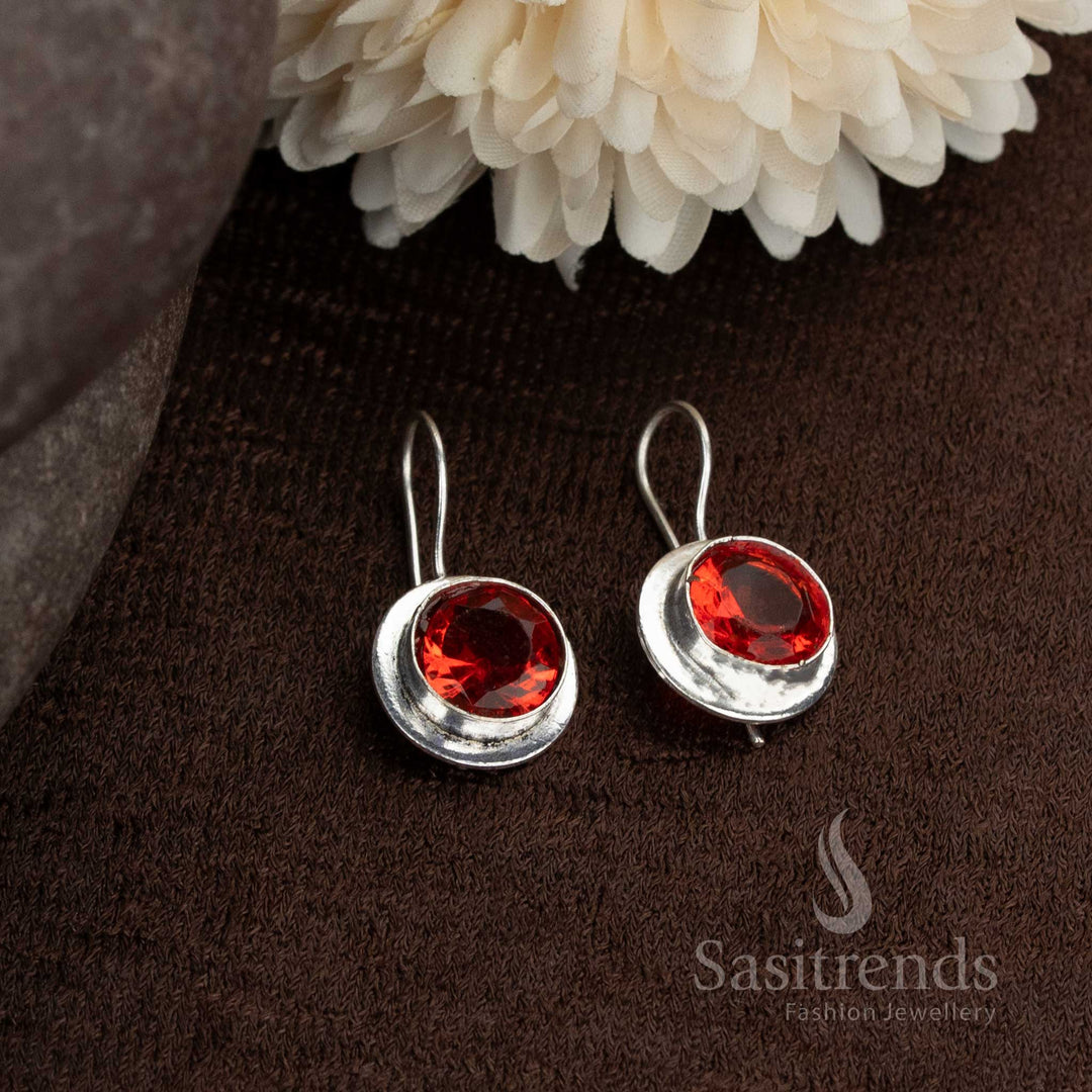 Bright red oxidised earrings with round stones ideal for sprucing up simple outfits from Sasitrends