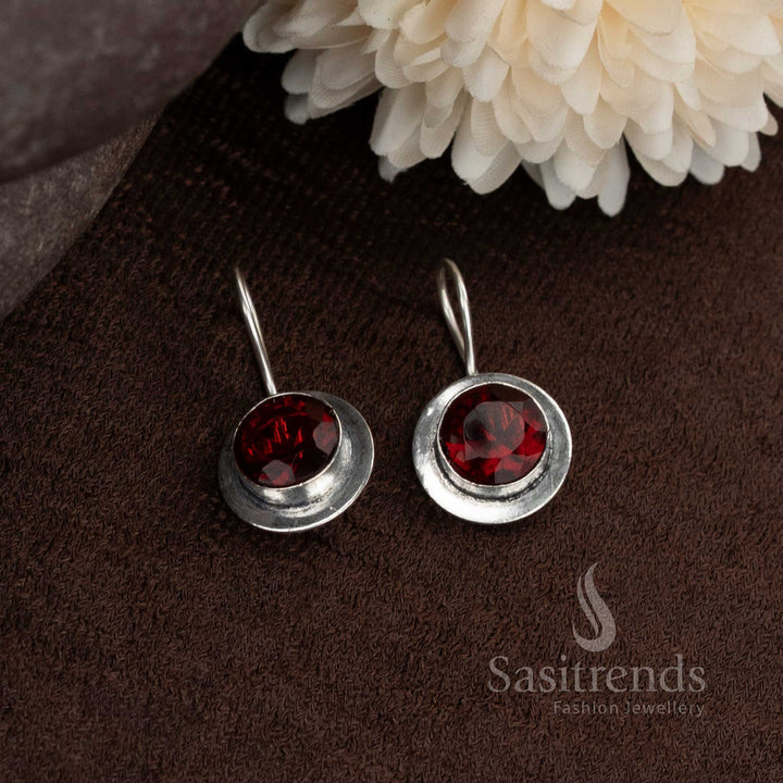 Rich maroon round  oxidised earrings giving a festive yet wearable look for everyday styling by Sasitrends