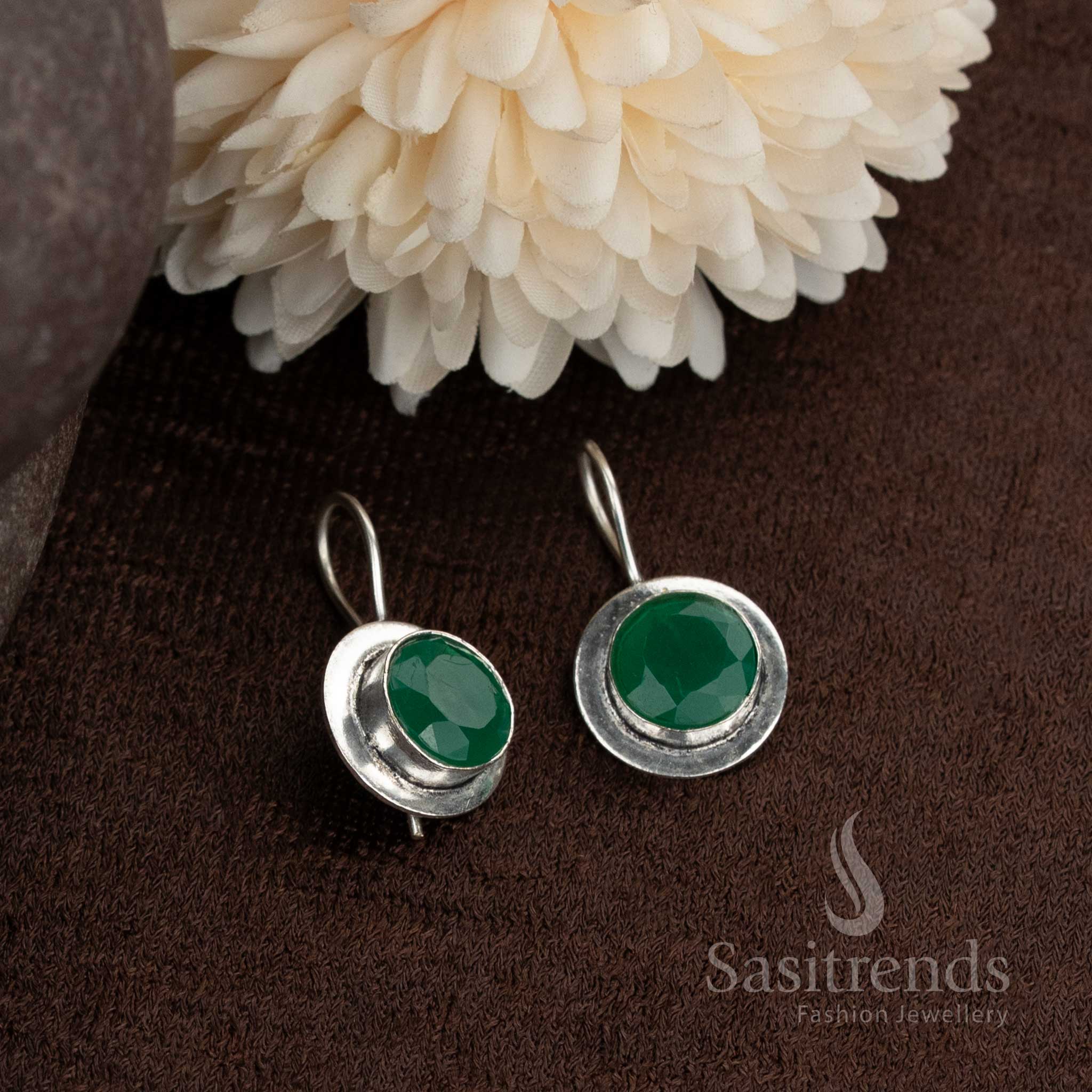 Natural green stone earrings in oxidised round design an ideal companion for kurtas and casual salwar suits from Sasitrends