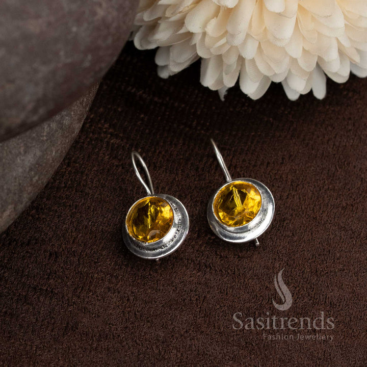 Cheerful yellow oxidised earrings in round style refreshing for daytime casuals or Navaratri styling from Sasitrends