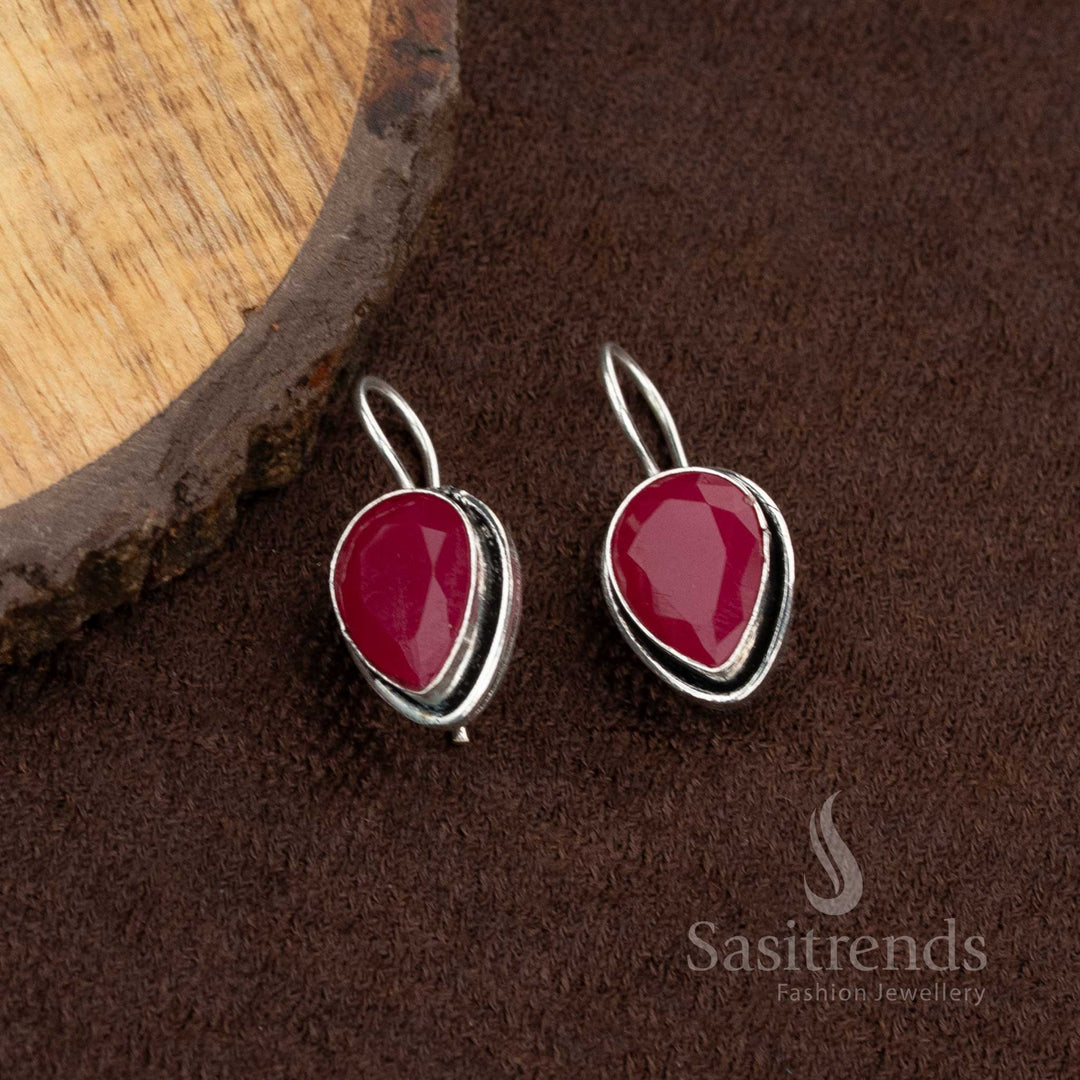 Elegant oxidised earrings with ruby-coloured stones, a nice choice for Navaratri events and workwear – Sasitrends