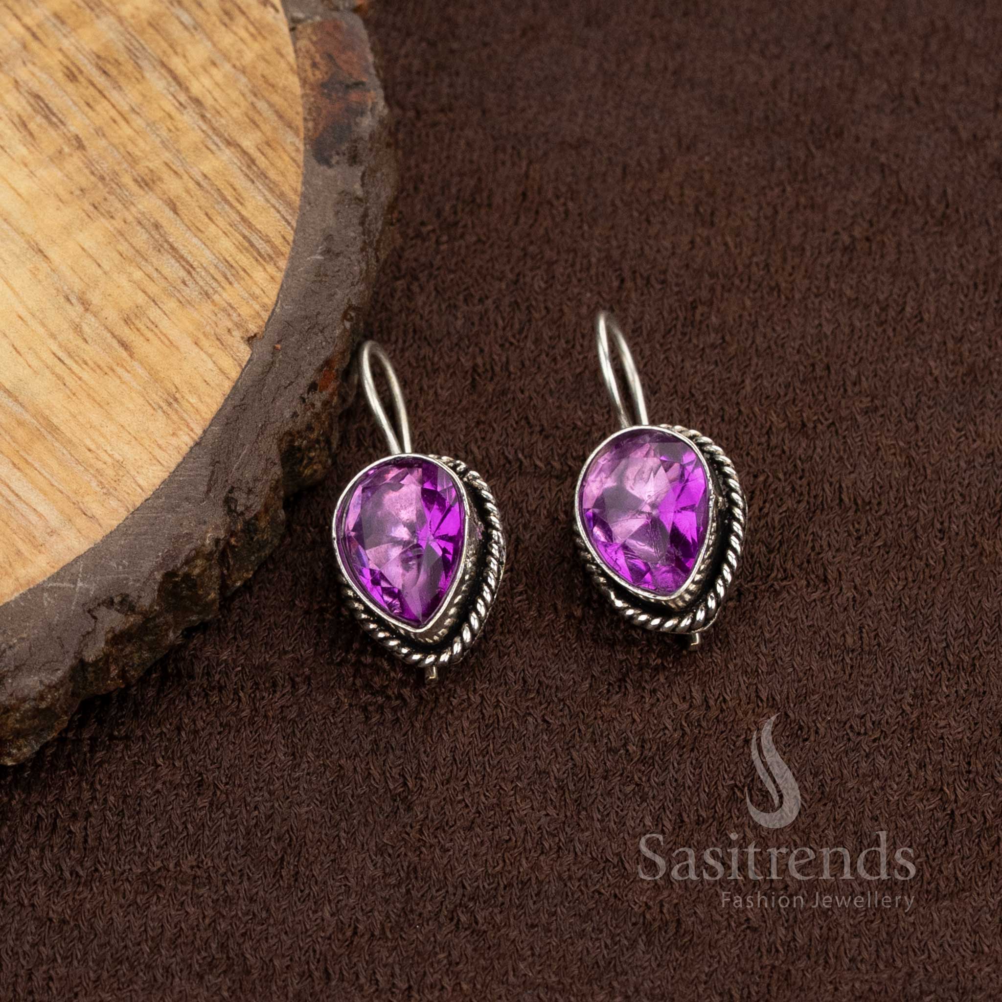 Teardrop earrings with deep violet stone in oxidised finish, suited for bold college or casual styles – Sasitrends
