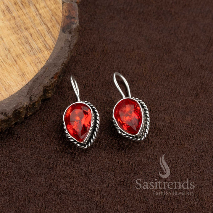 Glossy red stone in oxidised teardrop earrings, suitable for office and college wear – Sasitrends