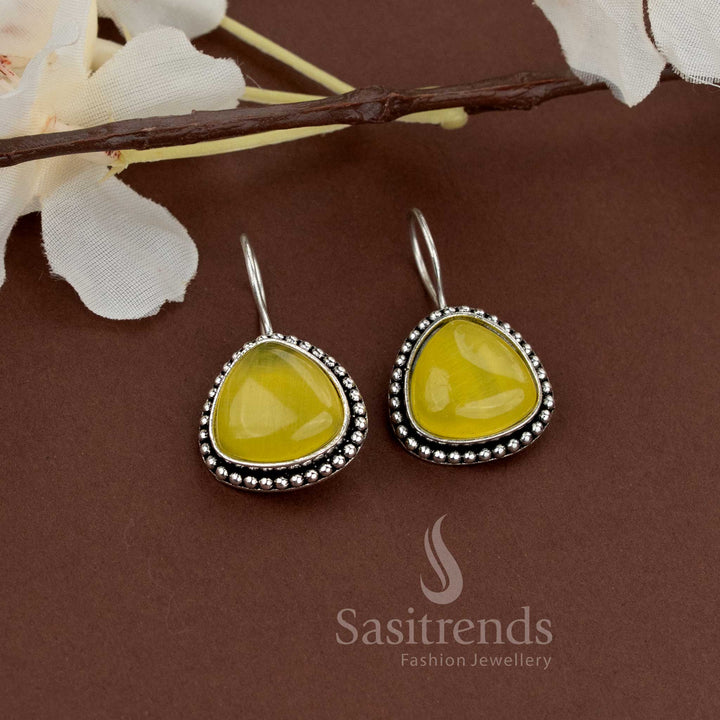 Bright yellow natural stone earrings with oxidised teardrop shape and bead border ideal for lively gatherings by Sasitrends