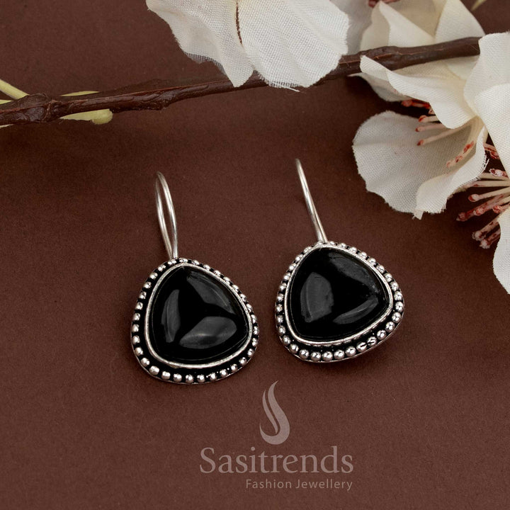 Oxidised teardrop earrings featuring a black natural stone framed with beads perfect for regular wear and festive functions from Sasitrends