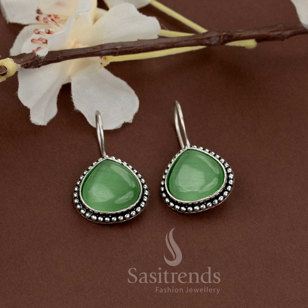 Refreshing light green stone earrings in teardrop shape with oxidised beads for simple elegant style from Sasitrends