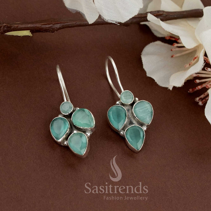Mint-toned natural teardrop stones in oxidised clustered earrings, great for relaxed everyday looks – Sasitrends