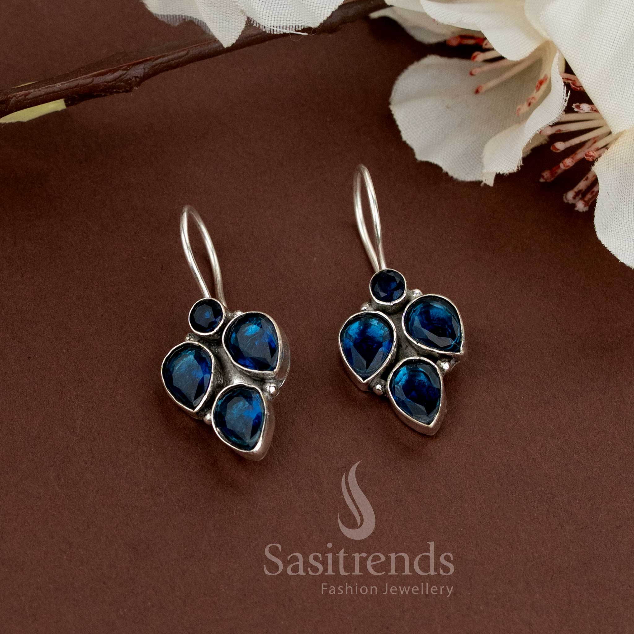 Clustered oxidised earrings with bright blue stones, suitable for casual everyday styling – Sasitrends
