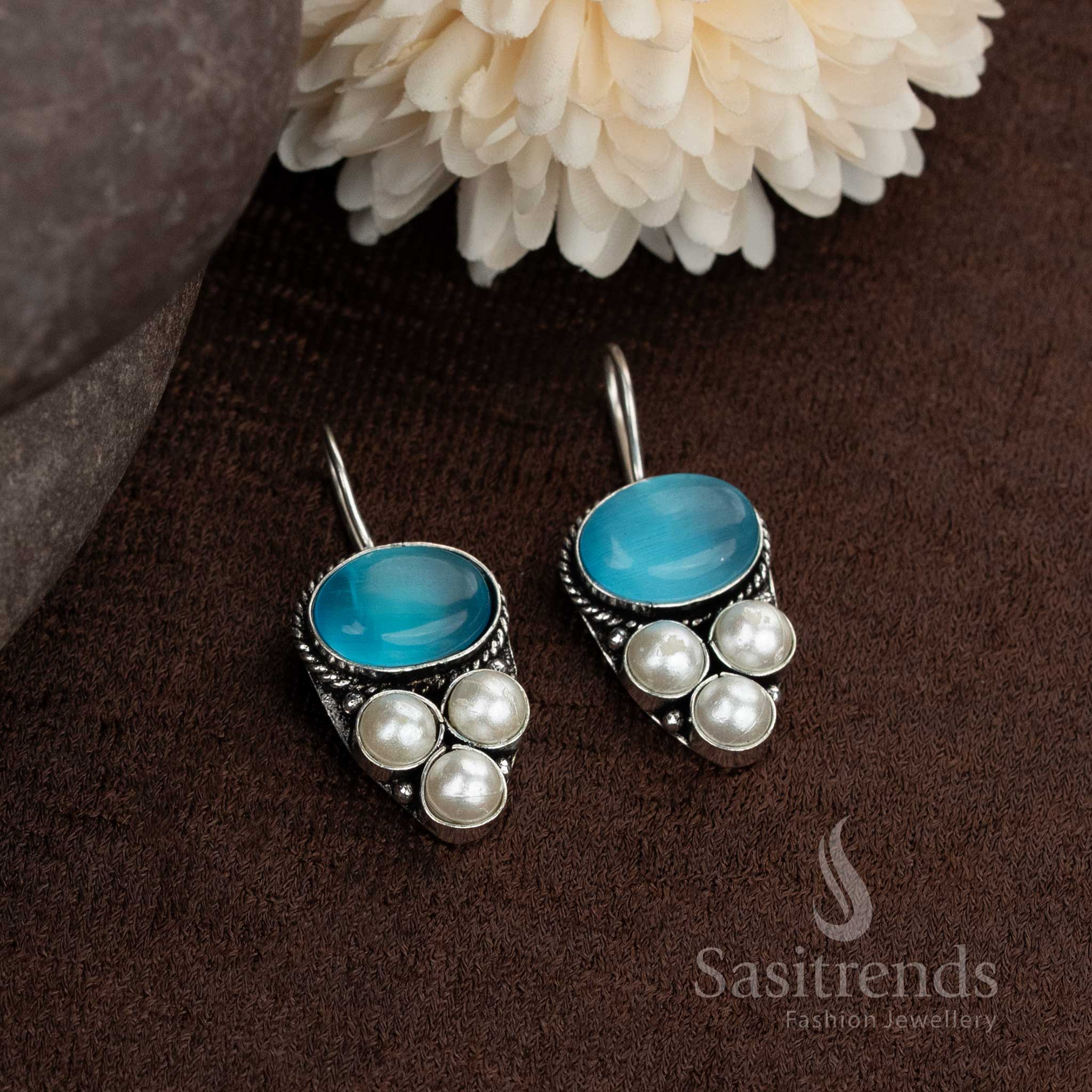 Oxidised earrings with oval natural stone and pearl design
