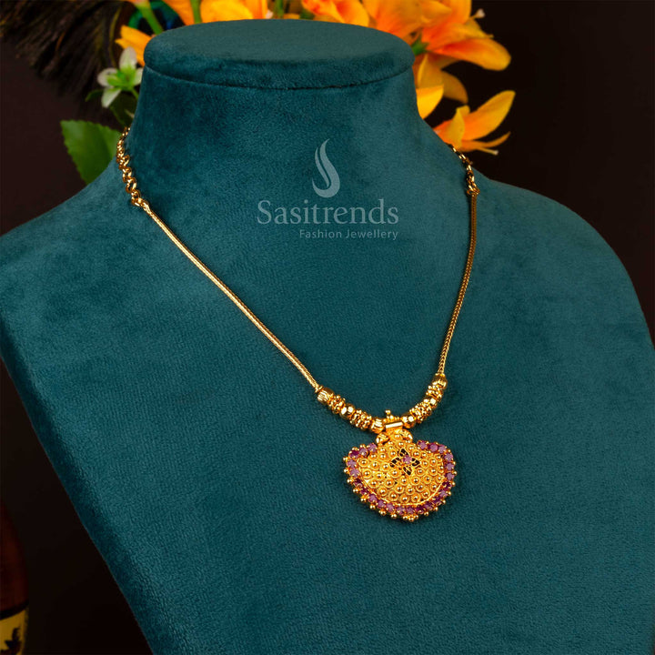 Charming ruby pendant necklace with intricate floral centrepiece and AD stones, finished in rich micro gold plating for bridal looks – Sasitrends