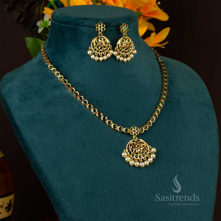 Elegant green Attigai necklace set in micro gold finish with shimmering pearl hangings and traditional AD jewellery work, perfect for ethnic saree styling – Sasitrends