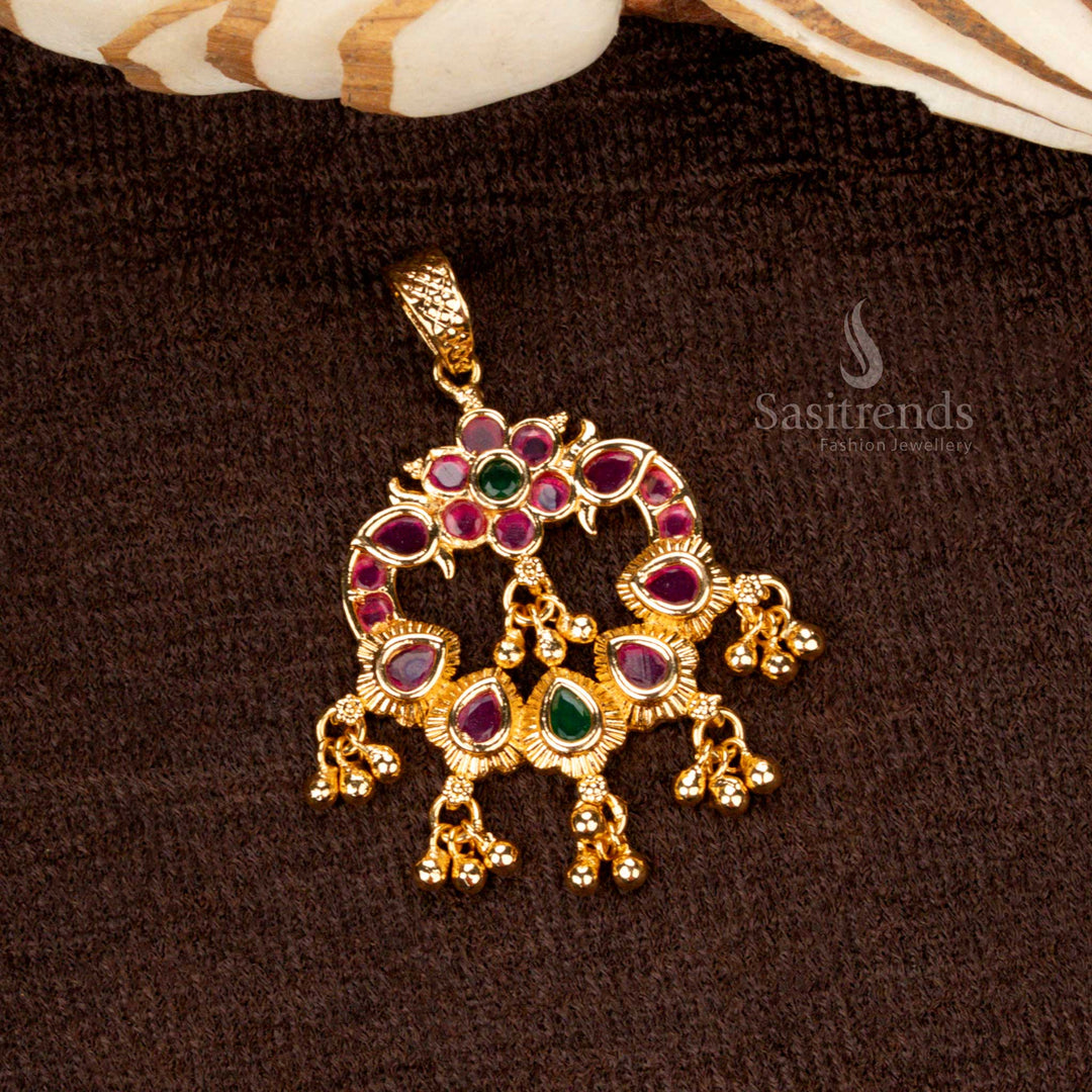 Elegant micro gold plated golden ball pendant with ruby-green dual stones and AD embellishments, radiating a regal charm - Sasitrends