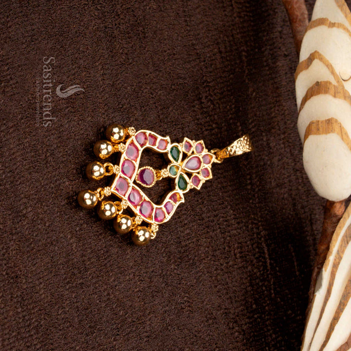Grand lotus floral designer golden ball pendant with micro gold plating, adorned with ruby-green stones and radiant American diamonds - Sasitrends