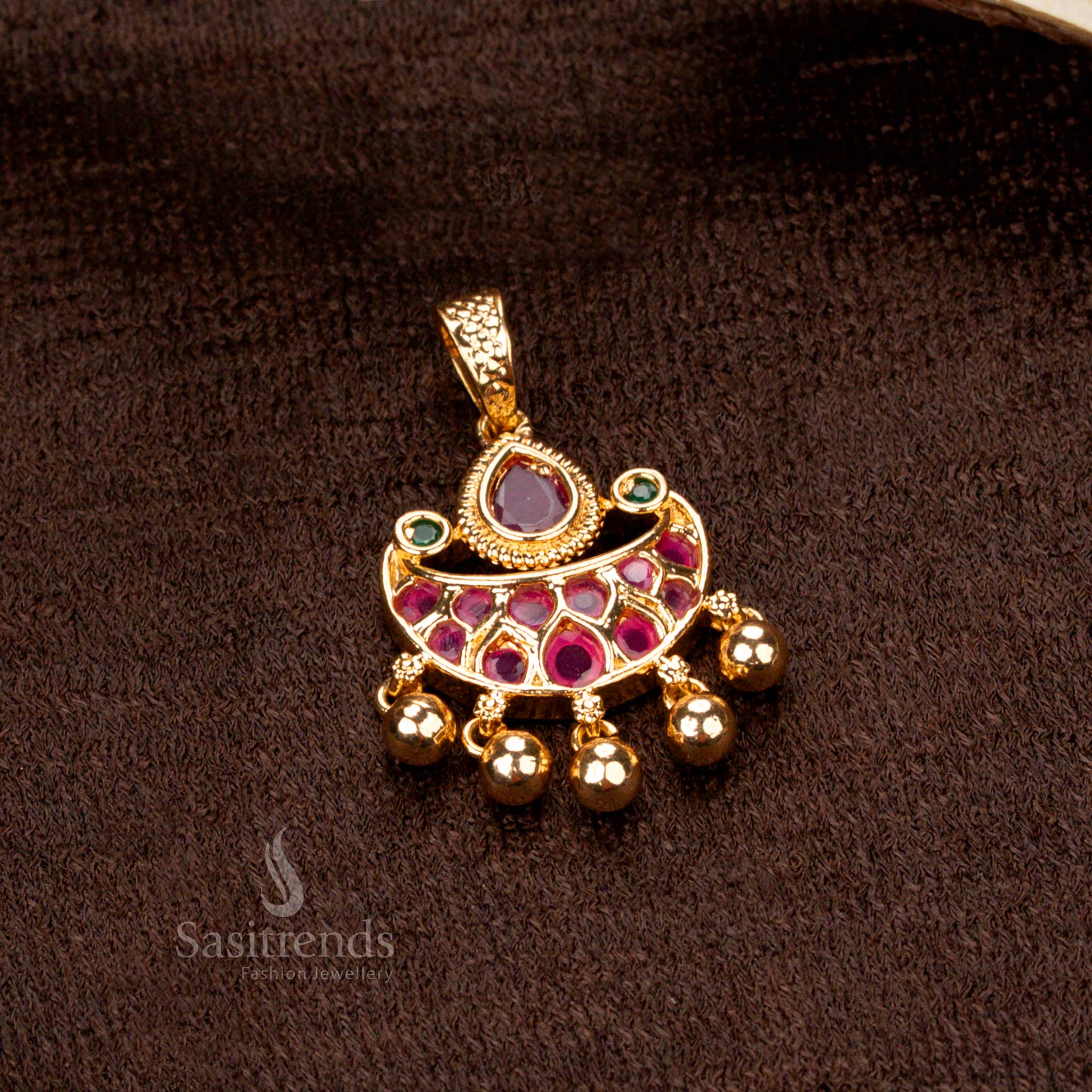 Beautifully crafted micro gold plated floral golden ball pendant with ruby-green stones and American diamond embellishments, a royal jewellery piece - Sasitrends