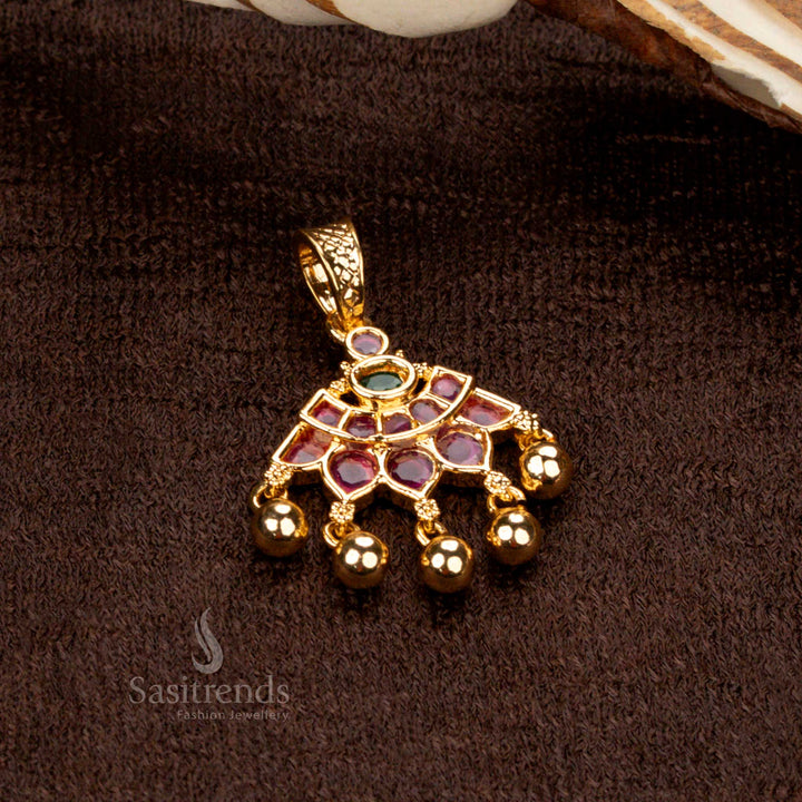 Ornate golden ball pendant with floral designs, micro gold plating, and striking ruby-green stones, perfect for festive and wedding wear - Sasitrends