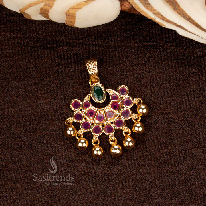 Handcrafted golden ball pendant featuring an ornate moon and floral motif with ruby-green stones and shimmering American diamonds - Sasitrends