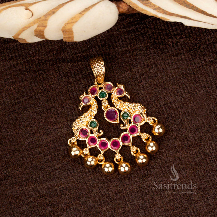Vibrant micro gold plated golden ball pendant featuring an artistic peacock design with ruby-green gemstone accents and shimmering AD stones - Sasitrends