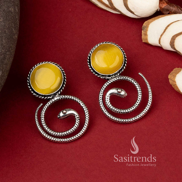 Coiled snake oxidized earrings with amber Monalisa stone