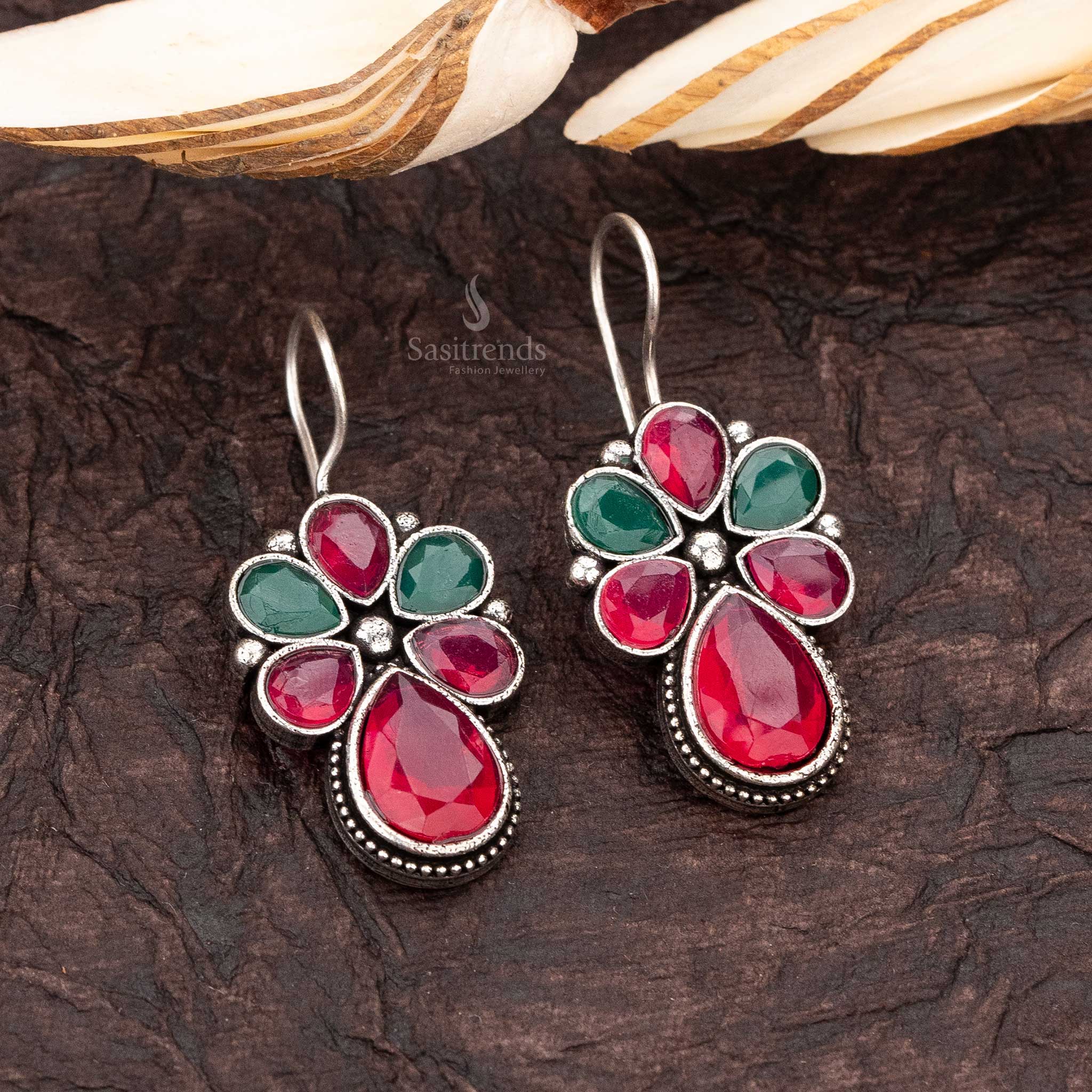 Emerald and Rosebud Navarathiri
Oxidised Leaf Earrings - Sasitrends