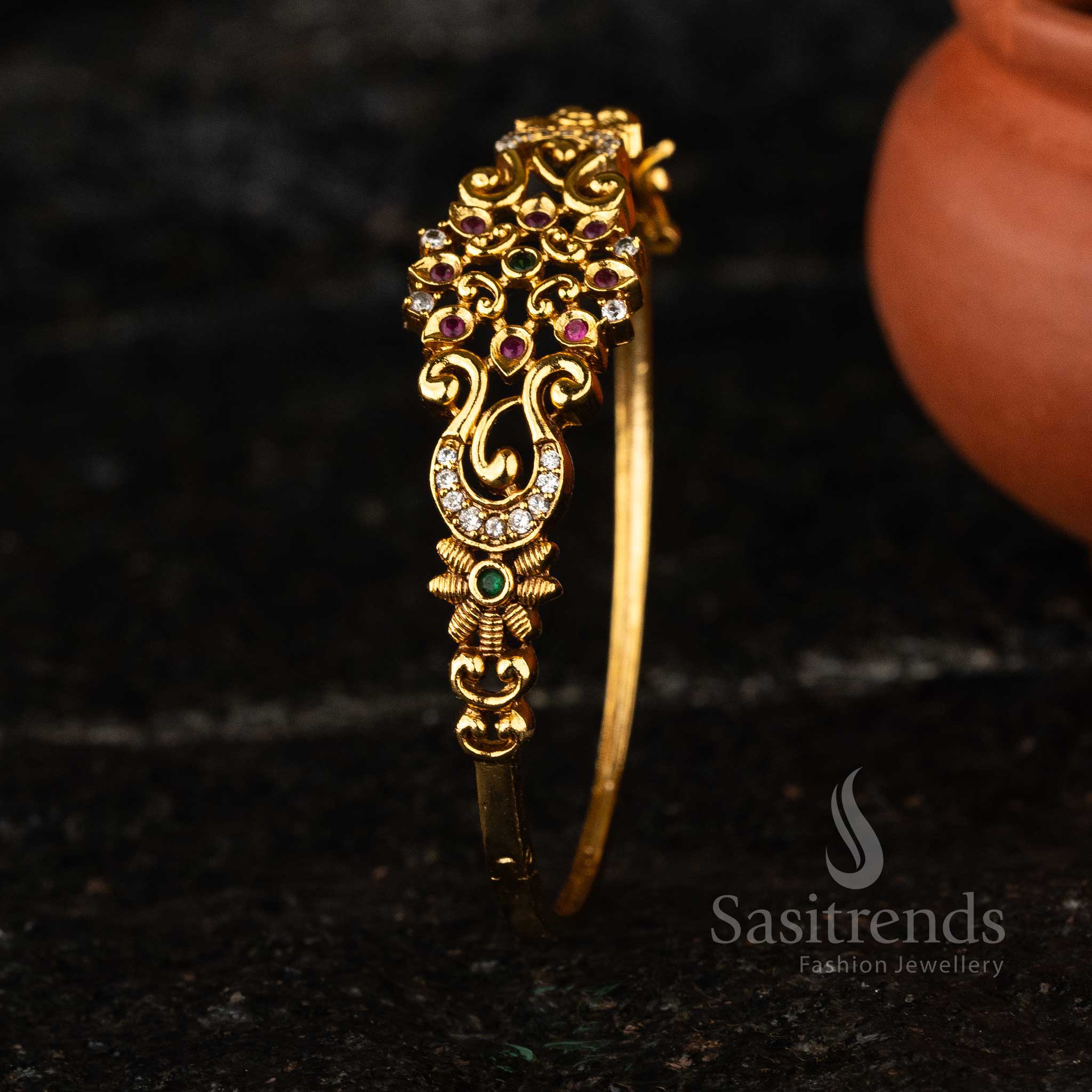 Stunning single-piece Temple Jewellery Kada Bangle in matte gold-plated brass, ideal for weddings and festive occasions.