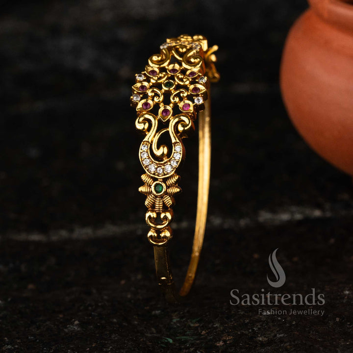 Stunning single-piece Temple Jewellery Kada Bangle in matte gold-plated brass, ideal for weddings and festive occasions.