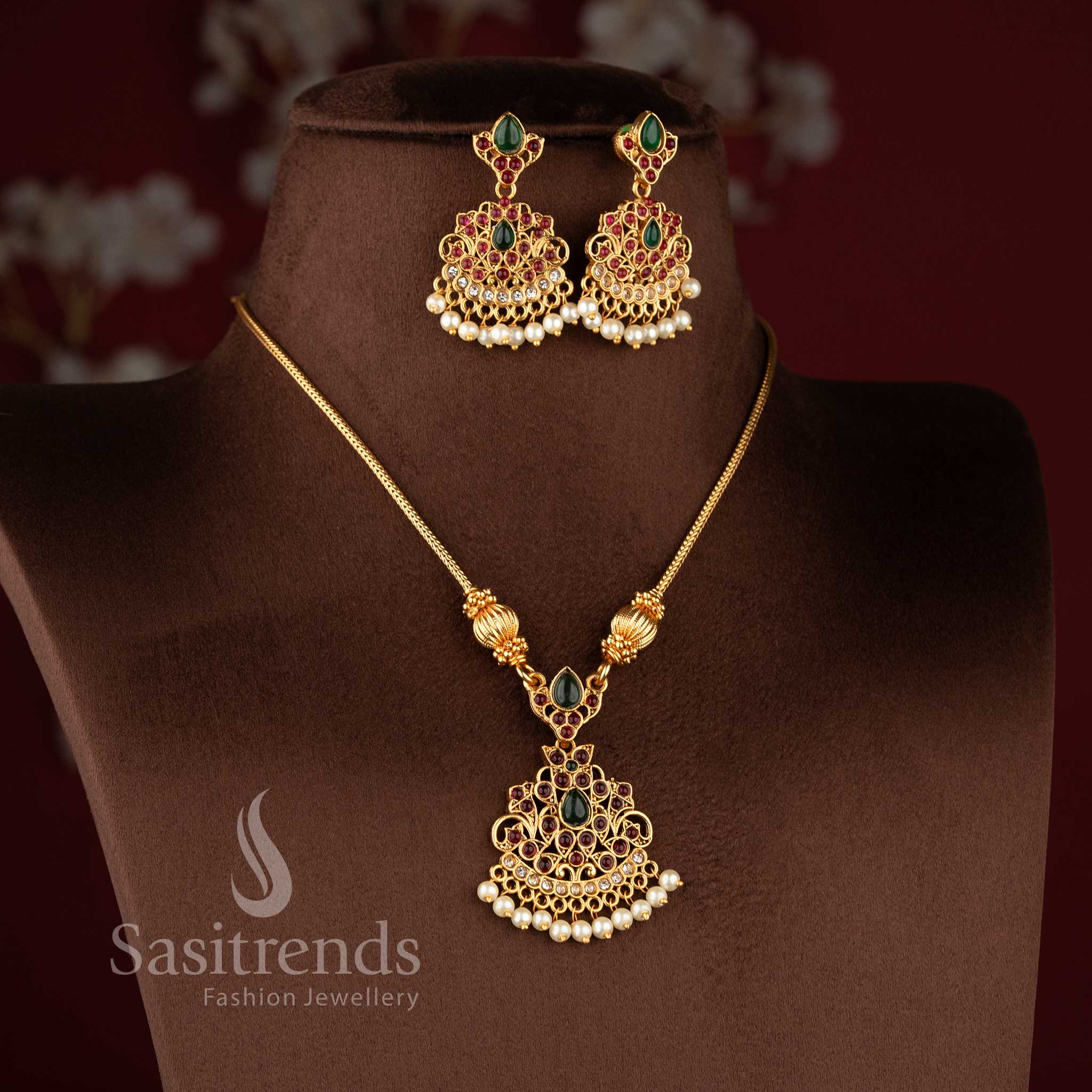 Traditional classic matte gold plated stone necklace set with pearl drops by Sasitrends