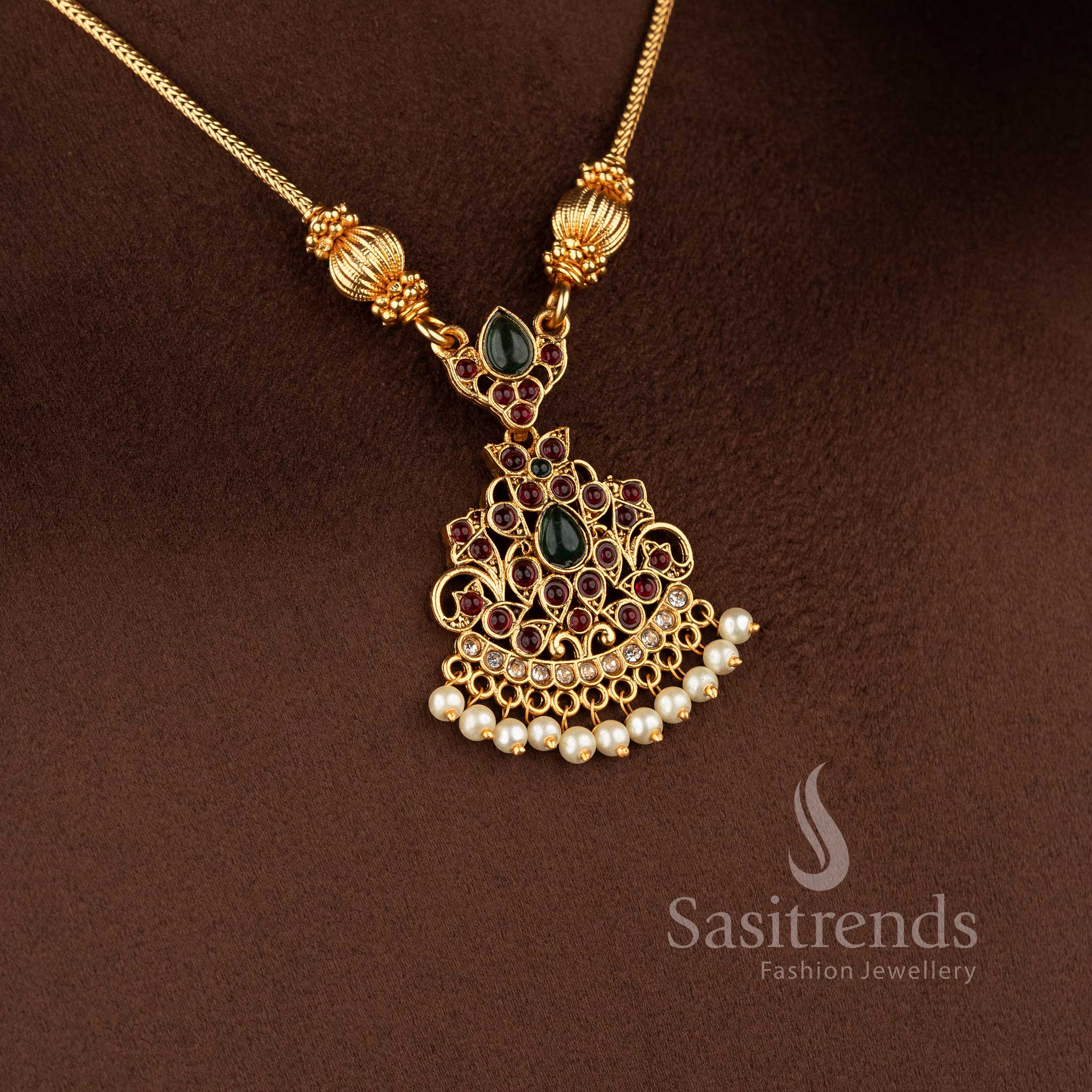 Traditional classic matte gold plated stone necklace set with pearl drops by Sasitrends.