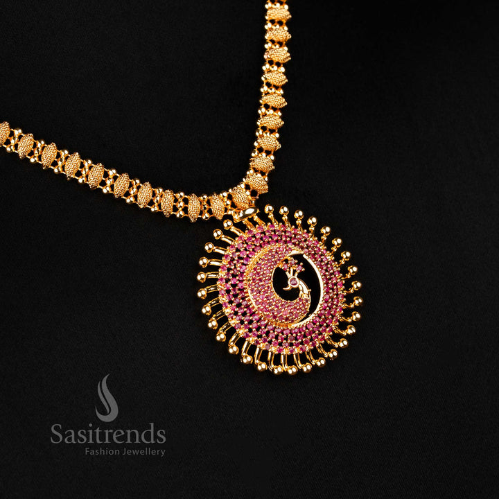 Regal ruby American diamond studded peacock pendant necklace in one gram micro gold finish – a perfect blend of heritage design and ethnic jewellery styling by Sasitrends