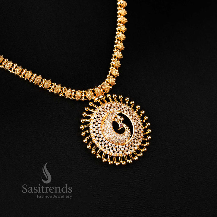 One gram gold plated peacock motif necklace enhanced with dazzling white American diamonds and a gracefully detailed pendant – traditional Indian festive jewellery crafted by Sasitrends