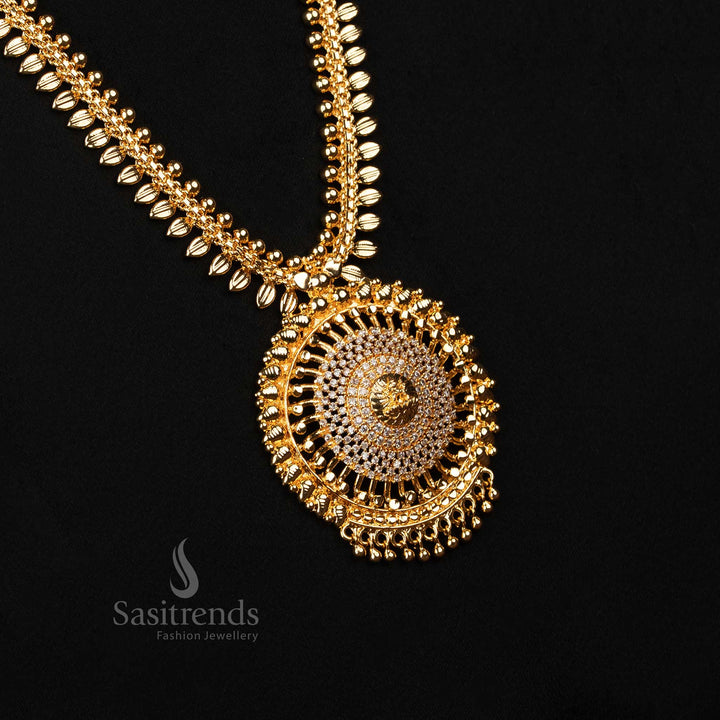 Sparkling white AD-studded haram necklace with micro gold finish, intricate Lakshmi pendant, and leafy elegance – An opulent and graceful choice for weddings – Sasitrends