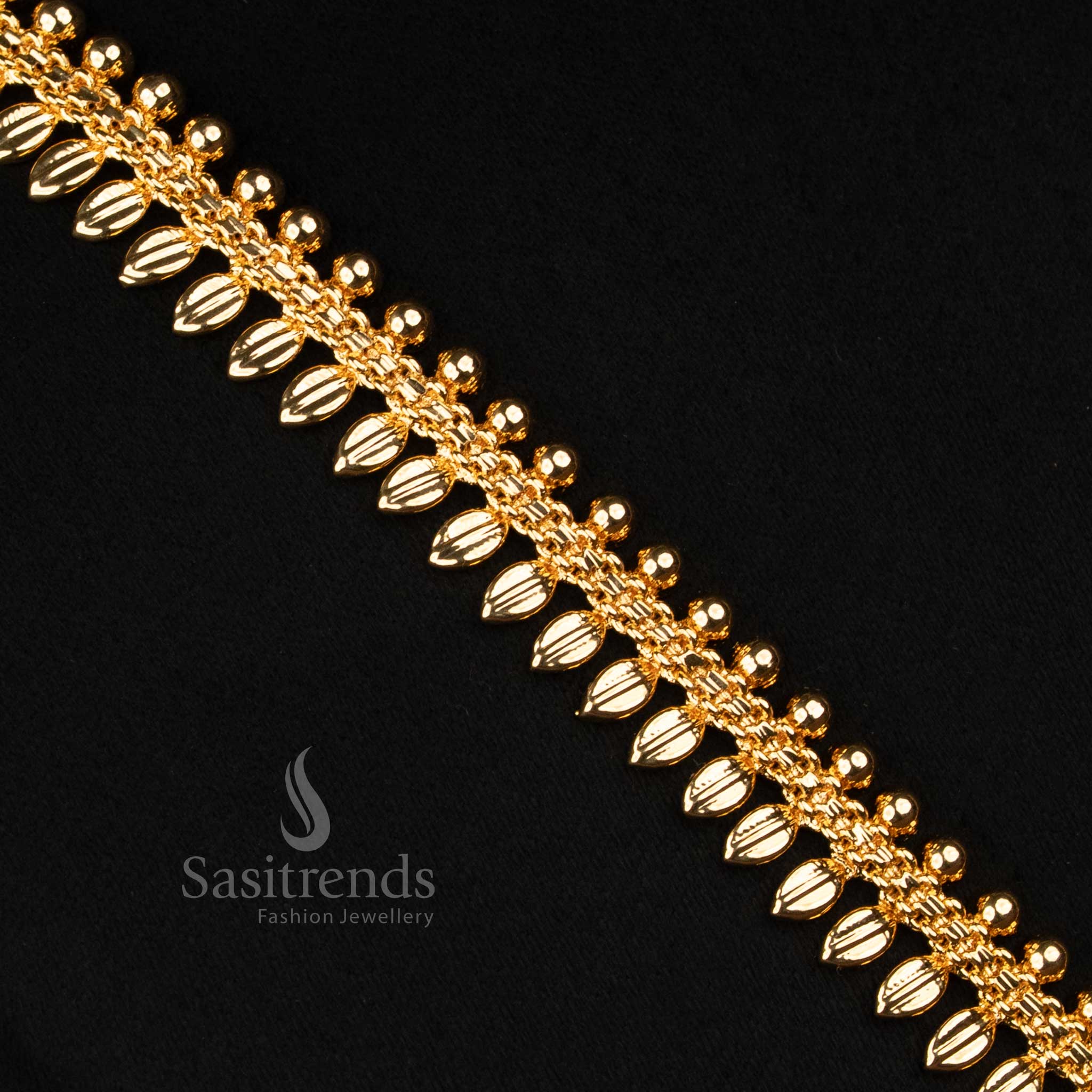 AD-studded Lakshmi haram necklace with festive charm, micro gold plating and nature-inspired leaf patterns – A vibrant pick for celebratory occasions – Sasitrends