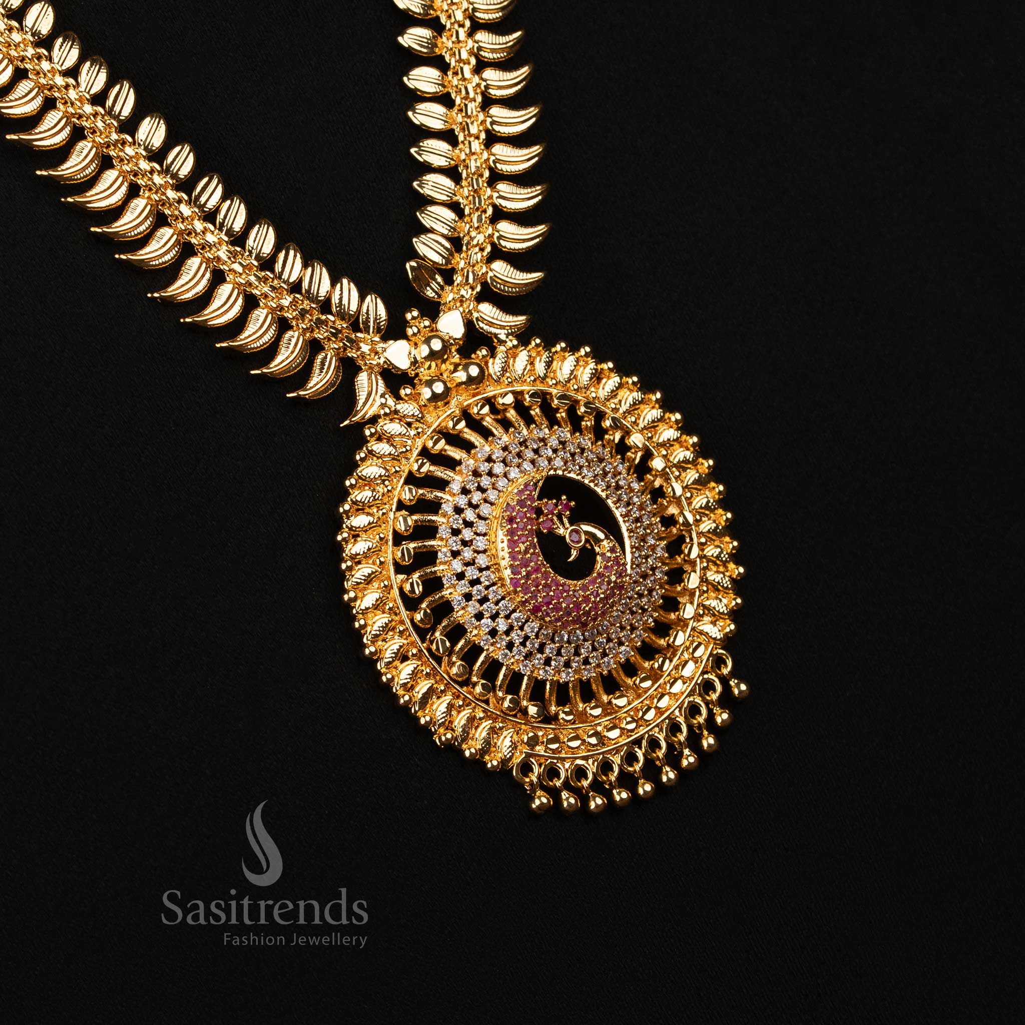 Elegant white-ruby hued long necklace adorned with peacock pendant and delicate leaf detailing, micro gold polished for traditional glow – Exquisite temple jewellery for women – Sasitrends

