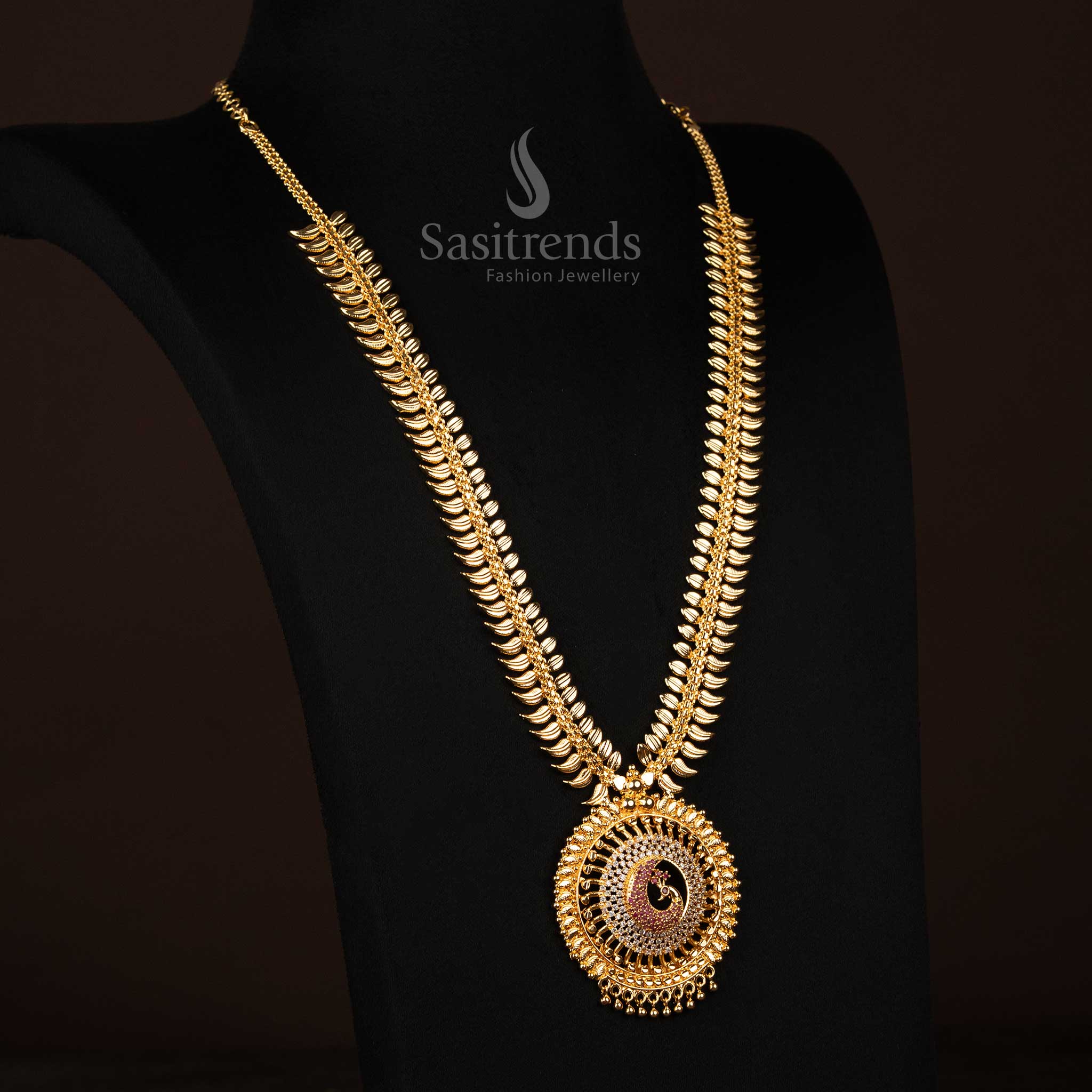 White-ruby long temple necklace with radiant peacock pendant, intricate leaf craftsmanship, and a glossy one gram gold polish – A celestial charm for bridal and festive grace – Sasitrends