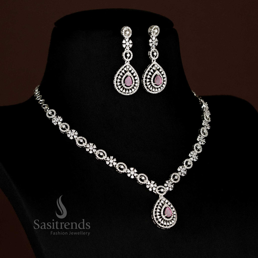 Detailed view of sparkling American Diamond rhodium plated necklace with intricate linked design and teardrop pendant - Sasitrends